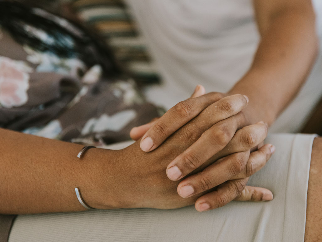 man and woman holding hands