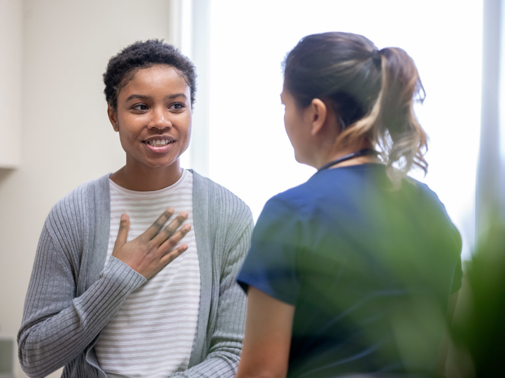 woman talking to her doctor