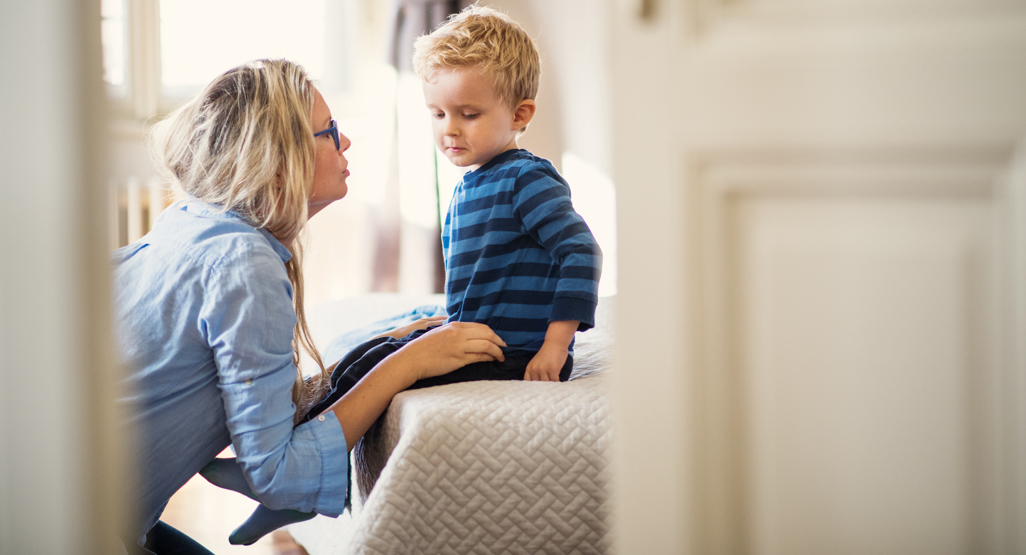 mother having a conversation with her young son