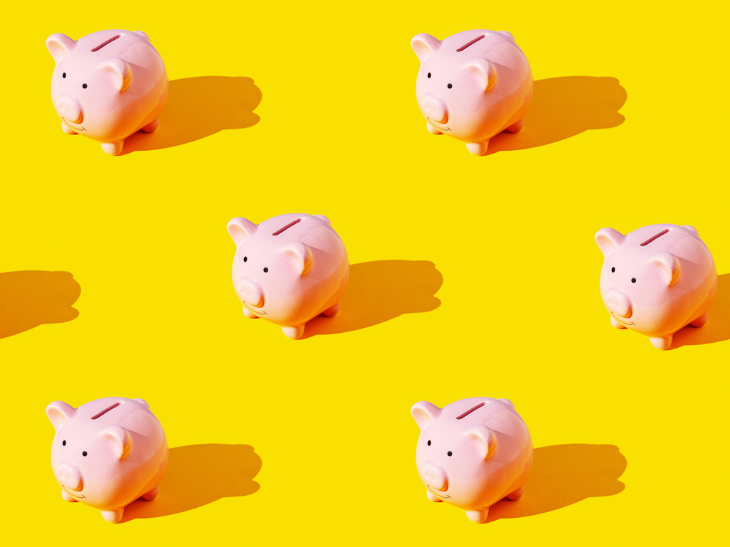 piggy banks on color background