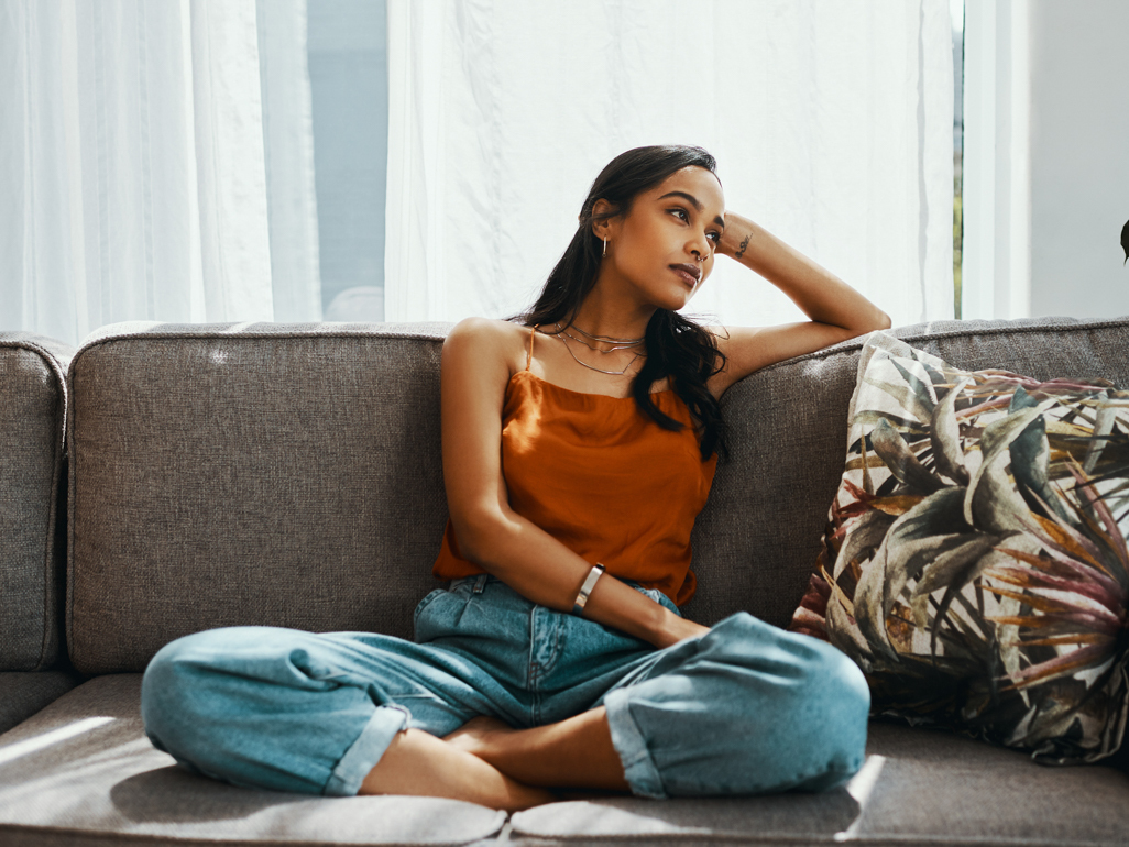 woman looking bored during two week wait