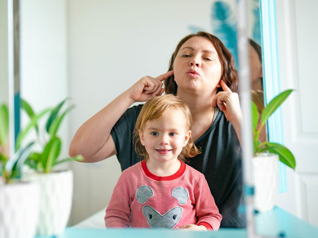 Mom teaching a toddler how to speak